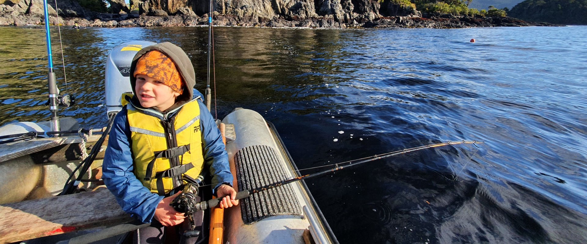 A child with a fishing rod