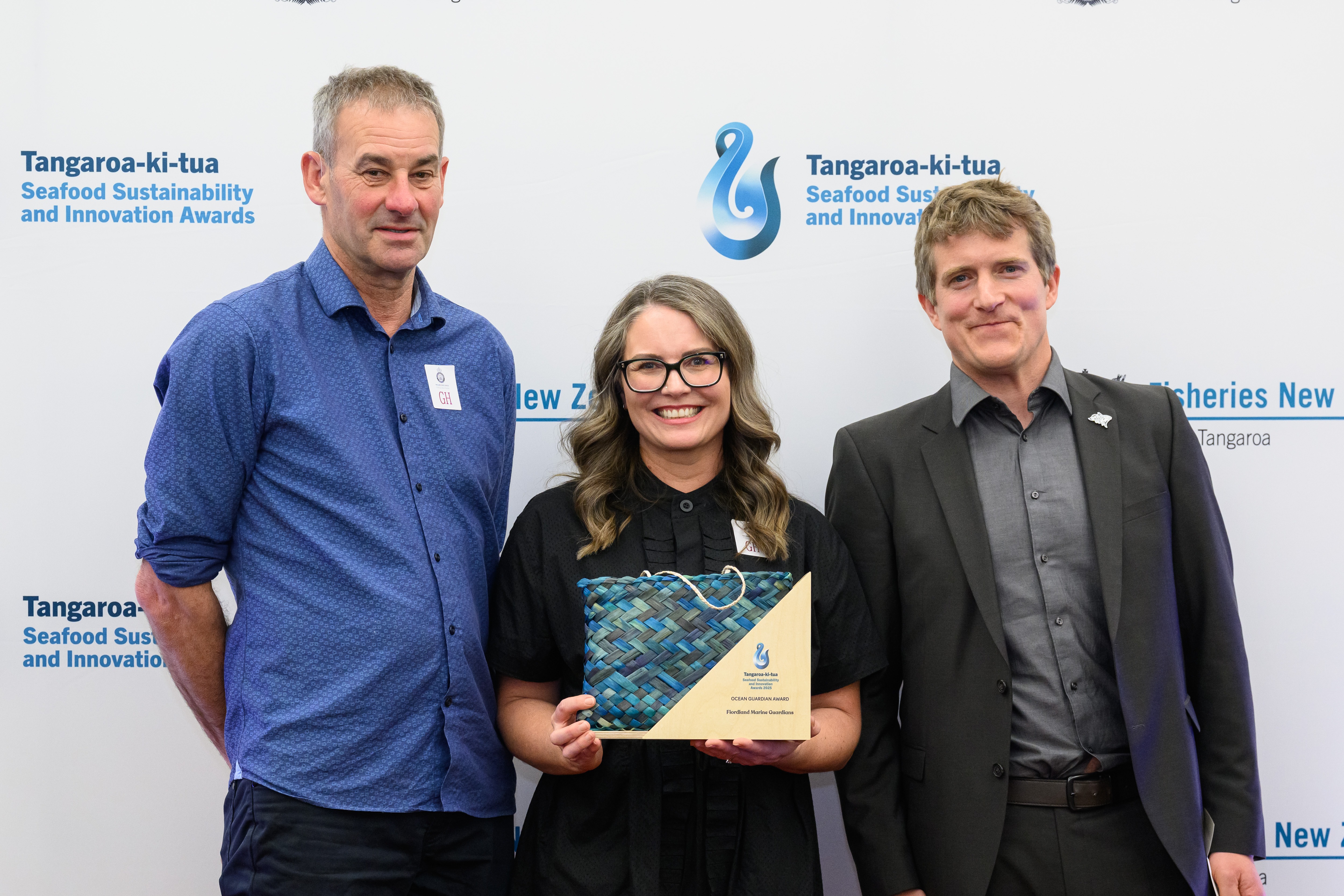 Pete Young and Dr Rebecca McLeod, Fiordland Marine Guardians, with Philipp Neubauer, Director, Dragonfly Data Science